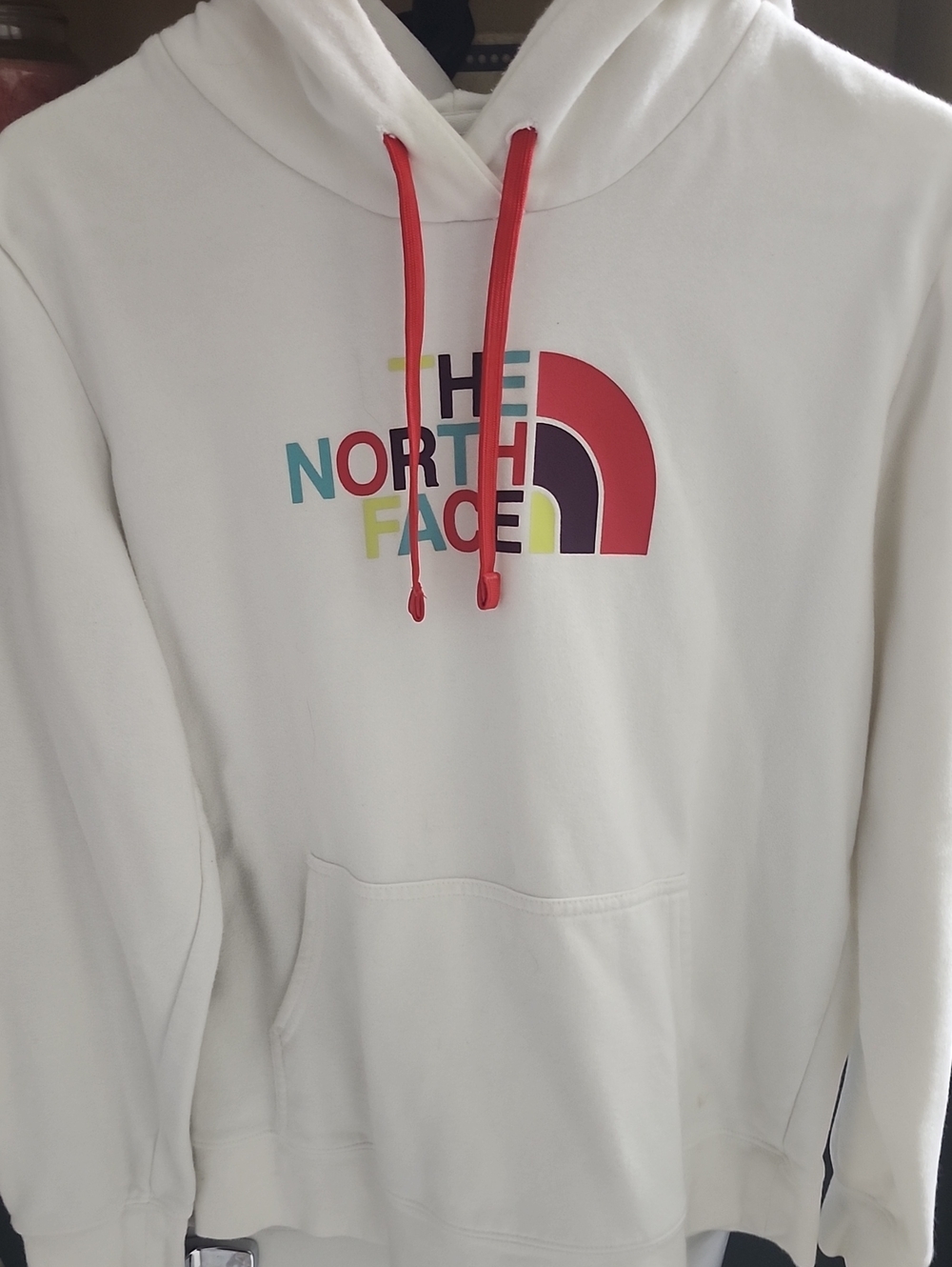 The North Face White Hoodie with Red Drawstrings and Multicolor Logo
